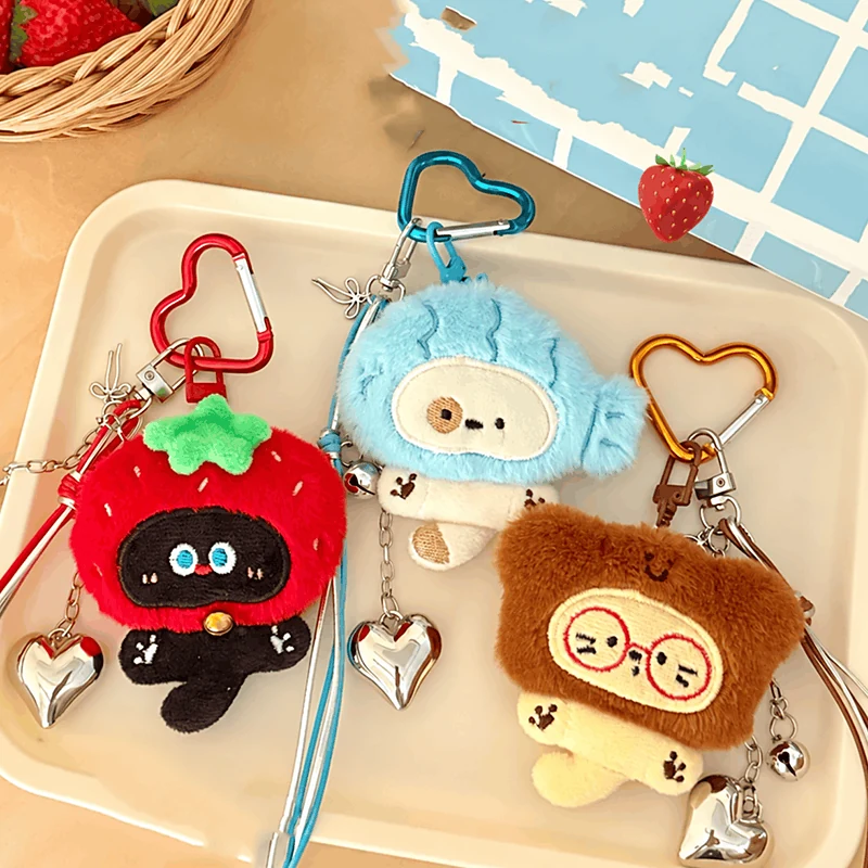 Three custom character plush bag charms with decorative heart clips