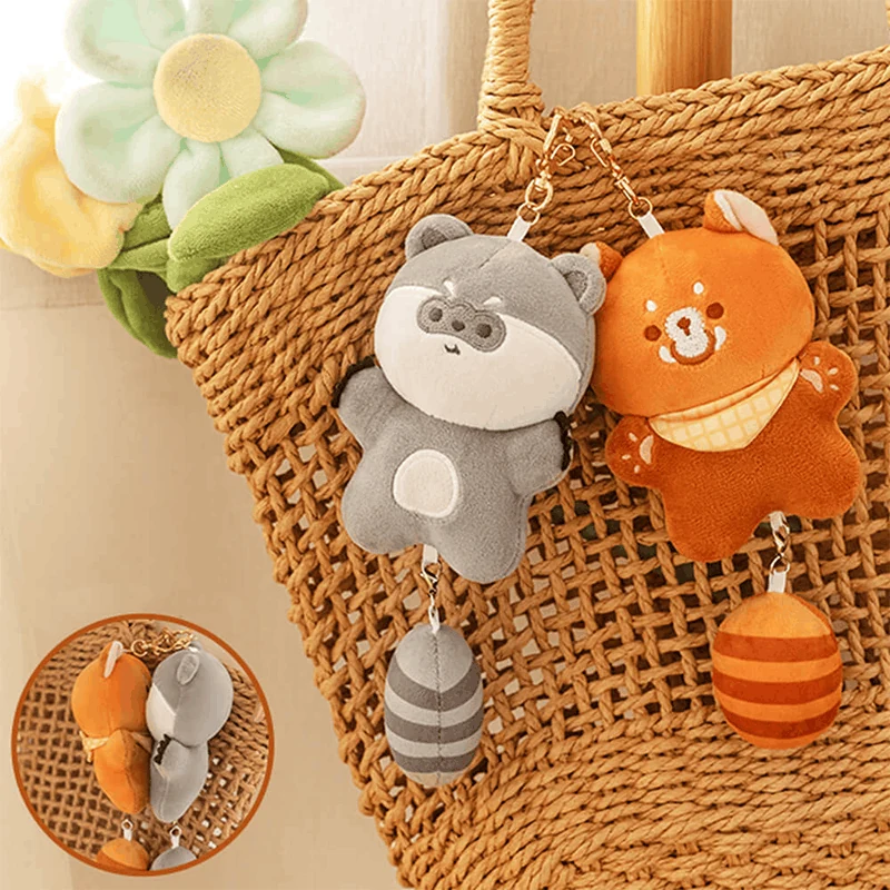Animal-themed plush keychains hanging on a woven handbag