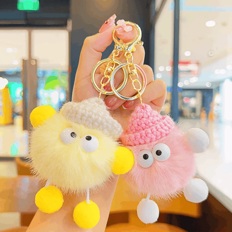 Soft yellow and pink fuzzy plush bag charms with gold keyrings